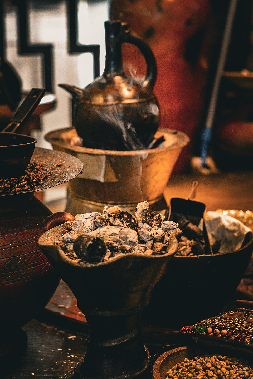 A clay jebena coffee pot and incense brazier from a traditional Ethiopian coffee ceremony in Addis Ababa in 2022