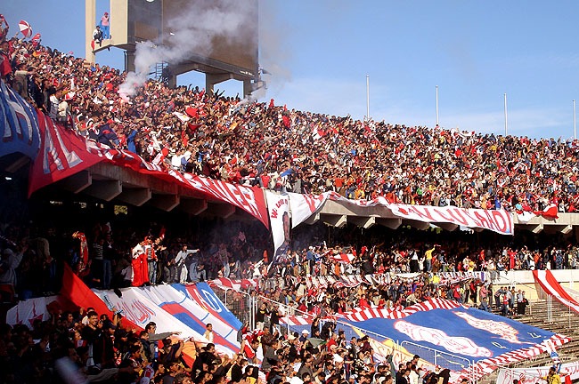 Fans in red and white fill the stands at Tripoli International Stadium, then called the 11 June Stadium, in Tripoli, Libya, January 2007